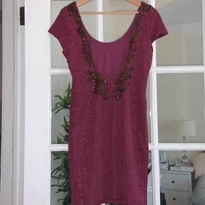 Beautiful burgundy shimmer scoop back embellished free people mini dress